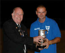 Dave Card President of Shropshire Crown Green Bowling Association presents the Glynn Hill Trophy to Castlefields Captain Andrew Duckett, Photo by Mark Burroughs