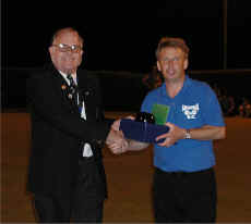 Dave Card President of Shropshire Crown Green Bowling Association presents the Alan `Wishy`Dodd Trophy to Castlefields star Paul Williams, Photo by Mark Burroughs