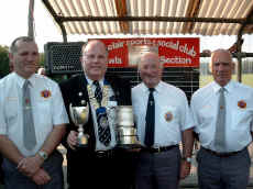 Officials line up before the start of the County Cup final, Referee Mike Potter, President Dave Card Pete Jones & Tony Kelly