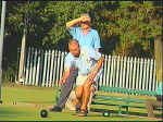 Playing into the sun is Captain Andy Duckett V Rod Manley