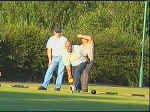 Richie Goddard send one across the green while playing Alan Purcell