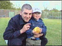 Premier Player Mark Rogers showing young Jack how to bowl, we start them young down the fields...