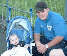 Young Owen being shown the green by uncle Steve Peach